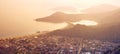 Turkish beach Oludeniz, Blue lagoon, mountains and roofs of houses from a bird`s-eye view from the mountain. Seascape Royalty Free Stock Photo