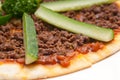 Turkish beef pizza with cucumber on top