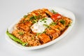 Turkish Beyti Kebab Served with Bulgur Pilaf and Yoghurt