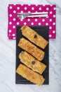 Turkish borek rolls with spinach and cheese on the white plate. A traditional Turkish pastry, Turkish name; rulo borek or sigara