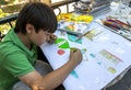 A Turkish boy draws various objects during an art class in Bursa in Turkey.