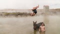 Turkish boy jumping off his horse into thermal water, friendship of boys with domestic animals, Guroymak, Bitlis