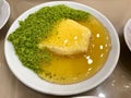 Turkish Breakfast Bal Kaymak / Honey and Butter Cream with Pistachio Powder served at Restaurant Royalty Free Stock Photo