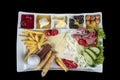 Turkish breakfast plate. Traditional delicious Turkish breakfast, food concept photo. Decoupage on a black background