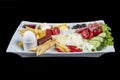 Turkish breakfast plate. Traditional delicious Turkish breakfast, food concept photo. Decoupage on a black background