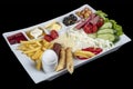 Turkish breakfast plate. Traditional delicious Turkish breakfast, food concept photo. Decoupage on a black background