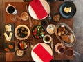 Turkish Breakfast Table with Tea, Coffee, Fresh Jams, Custard / Curd Cheese, Honey, Cream, Bagel and Bread. Royalty Free Stock Photo