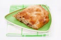 Turkish burek with meat on a green plate Royalty Free Stock Photo