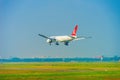 Turkish Cargo Airbus A330-200 TC-JDS cargo plane fly over urban areas preparing landing into Tan Son Nhat International Airport