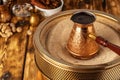 Turkish coffee in cezve on the sand Royalty Free Stock Photo