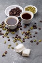 Turkish Coffee with coffee beans and Cardamom scattered on a vintage background Royalty Free Stock Photo