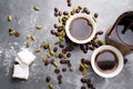 Turkish Coffee with coffee beans and Cardamom scattered on a vintage background Royalty Free Stock Photo