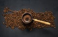 Turkish coffee concept, traditional hot drink coffee in copper coffee pot Royalty Free Stock Photo