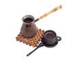 Turkish coffee in copper coffee pot and black ceramic cup Royalty Free Stock Photo