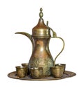 Turkish coffee set: Ottoman ornate coffee pot and ornate cups isolated on white with clipping path Royalty Free Stock Photo