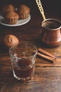 Turkish coffee with spices and muffins Royalty Free Stock Photo