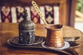 Turkish coffee with traditional embossed metal tray and cup Royalty Free Stock Photo