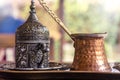 Turkish coffee with traditional embossed metal tray and cup Royalty Free Stock Photo