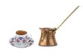 Turkish coffee with traditional ottomans motif cup and copper coffe pot Royalty Free Stock Photo