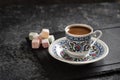 Turkish Coffee with traditional porcelain cup. Coffee with Turkish delight.