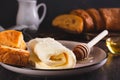 Turkish creamy dairy kaymak, honey and bread on a breakfast plate Royalty Free Stock Photo