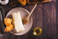 Turkish creamy dairy kaymak, honey and bread on a breakfast plate top view Royalty Free Stock Photo