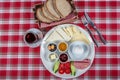 Turkish Cuisine Breakfast Plate. White breakfast plate with sliced cherry tomatoes, cucumber and boiled egg with on wooden table Royalty Free Stock Photo