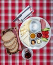 Turkish Cuisine Breakfast Plate. White breakfast plate with sliced cherry tomatoes, cucumber and boiled egg with on wooden table Royalty Free Stock Photo