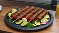 Turkish cuisine traditional delicious Adana kebap grilled meat food dinner.