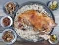 Turkish Cuisine Whole lamb carcass roasted on a spit. Roast whole lamb stuffed with rice pilaf. Roast whole lamb ready to serve on Royalty Free Stock Photo