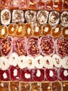 Turkish delight background. a bunch of assorted Turkish delicacies with and without nuts Royalty Free Stock Photo