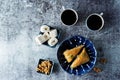 Turkish delight. Baklava and coconut lukum with cups of coffee