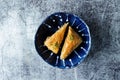 Turkish delight. Baklava and coconut lukum with cups of coffee