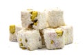 Turkish Delight Double Roasted Sultan Wick with Coconut Flakes, isolated on a white background. Close-up pistachio Turkish delight Royalty Free Stock Photo