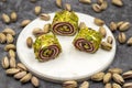 Turkish Delight with Grated Pistachio. Turkish delight with pistachio on a dark background. Royalty Free Stock Photo