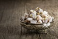 Turkish delight in hollowware, traditional turkish sweet double roasted with pistachio nuts and coconut Royalty Free Stock Photo