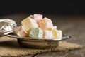 Turkish delight in hollowware, traditional turkish sweet double roasted with pistachio nuts and coconut Royalty Free Stock Photo