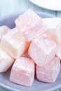 Turkish delight or lokum confection rose and lemon flavored, vertical, closeup Royalty Free Stock Photo