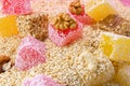 Turkish delight with nuts on a sesame seed pile Royalty Free Stock Photo