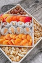 Turkish delight oriental sweets dried fruits and nuts in a wooden box. Background. Healthy vegan food. Natural food. Selective Royalty Free Stock Photo