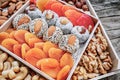 Turkish delight oriental sweets dried fruits and nuts in a wooden box. Background. Healthy vegan food. Natural food. Selective Royalty Free Stock Photo