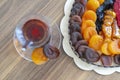 Turkish delight oriental sweets dried fruits and nuts in a wooden box with Turkish tea Royalty Free Stock Photo