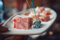 Turkish Del, oriental sweets on a plate in a restaurant, Arabian interior. eastern tea ceremony. Selective focus, Hookah bar, rest Royalty Free Stock Photo