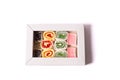 Turkish delight in box. Asian sweets isolated on a white Royalty Free Stock Photo
