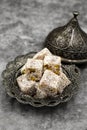 Turkish delight with pistachio on a dark background Royalty Free Stock Photo