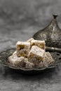 Turkish delight with pistachio on a dark background Royalty Free Stock Photo