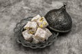 Turkish delight with pistachio on a dark background Royalty Free Stock Photo