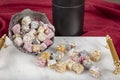 Turkish delight with pistachio and powdered sugar, carefully packed. Assortment of turkish delight in a gift box Royalty Free Stock Photo