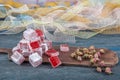 Turkish delight, rose flavored Turkish delight on the plate. Turkey delight sweet taste delicious moments of indispensable
