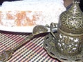 Turkish delight from rose petals and Fildjan - turkish coffee cup and saucer. Oriental sweets. Natural and healthy food. Royalty Free Stock Photo